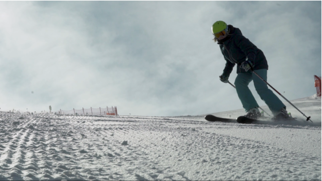 Women skiing down a ski slope
