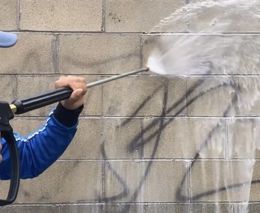 Graffiti removal pressure washing
