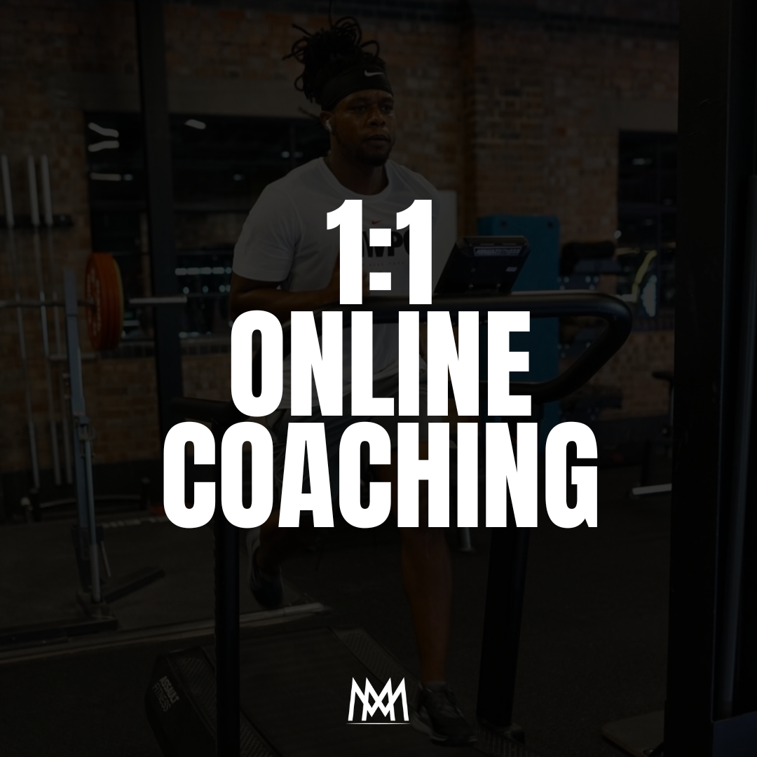 A person walking on a treadmill in a gym with brick walls during online coaching session.