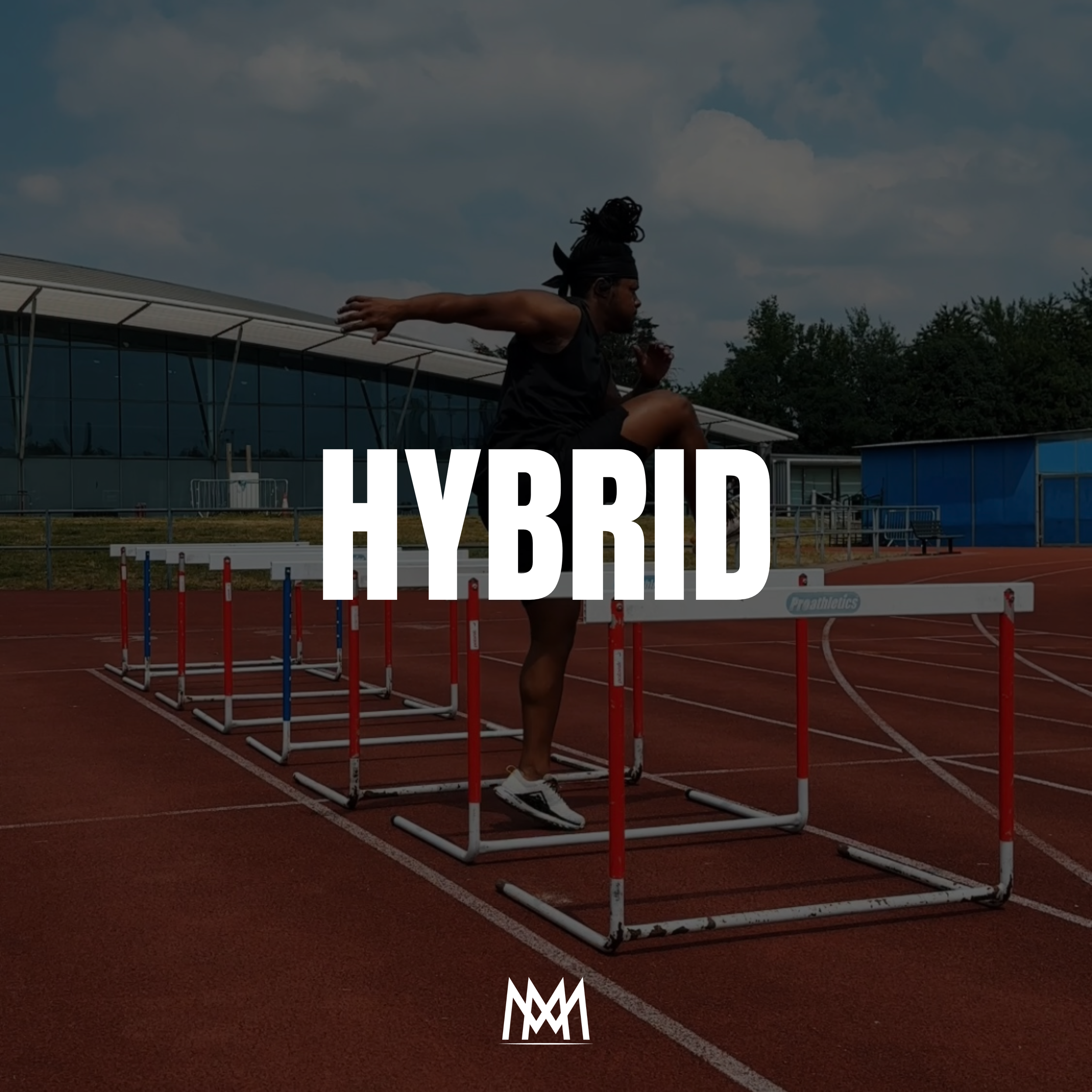 Athlete jumping over hurdles on a track at an outdoor stadium.