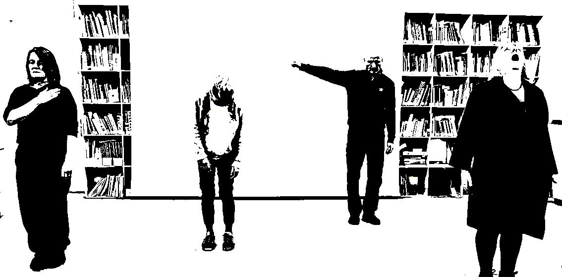 Polarised photo of 4 people standing apart in a room lined with bookshelves. Each person is making a different shape with their body.