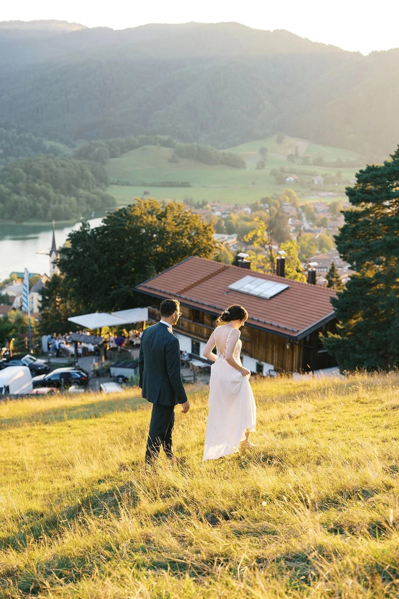 A fine art photograph of a wedding couple eloping in Schliersee, in the south of Germany during the sunset hour.