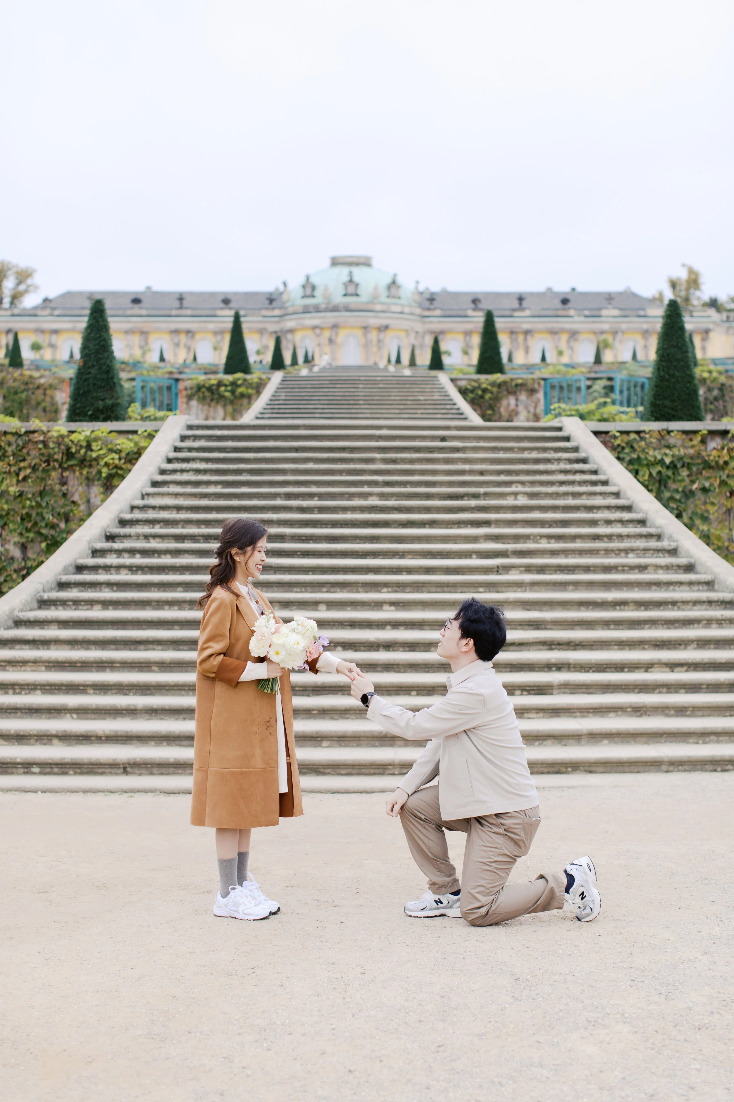 proposal at schloss sanssouci park in front of stairs