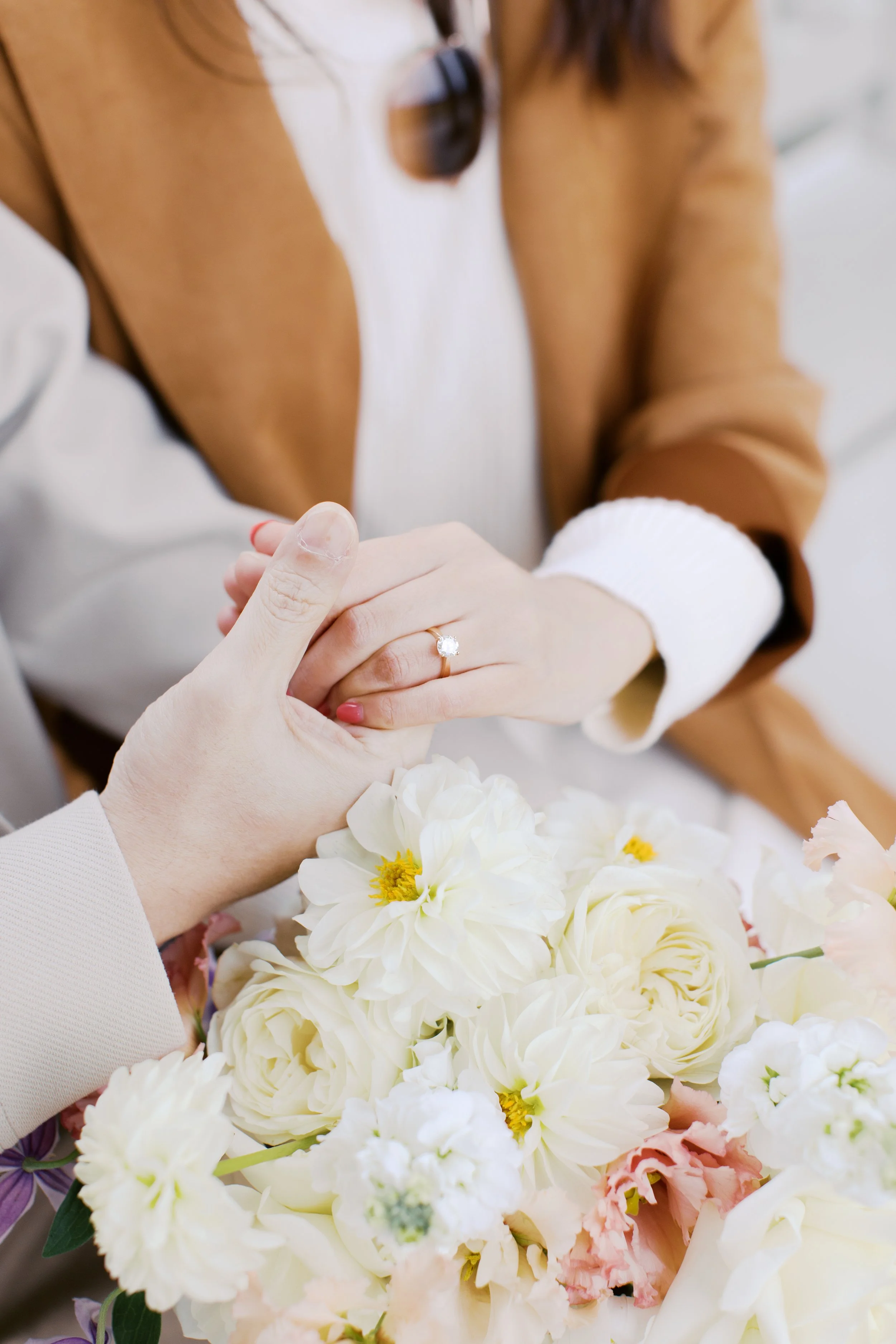 proposal at schloss sanssouci park with a closeup of rings