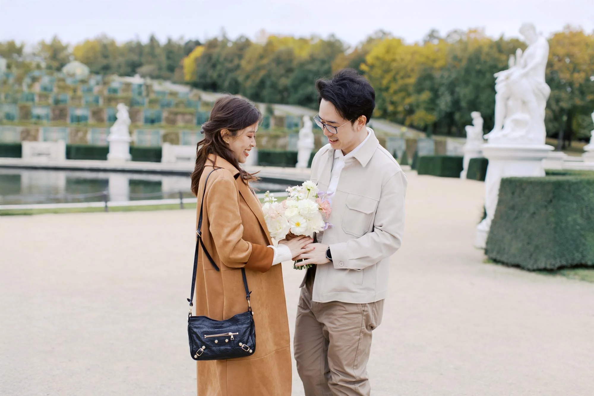 proposal at statue at ​potsdam sanssouci park