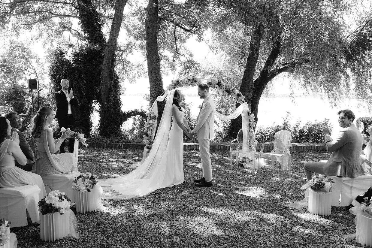 Couple making vows with another at ceremony at Gut Schloss Golm