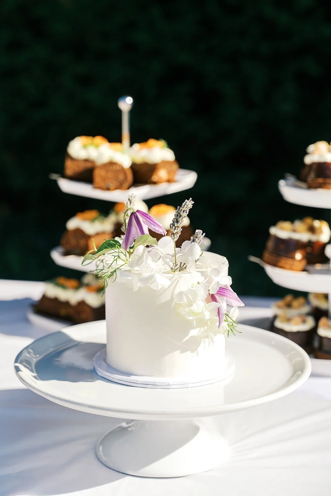 Cake with pastries on a table at Gut Schloss Golm