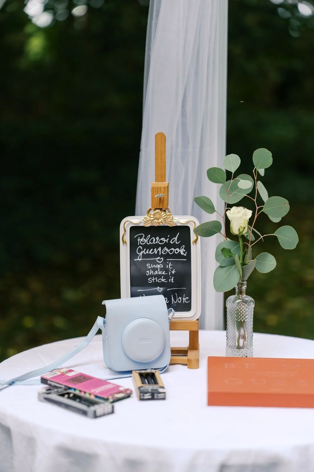 A film camera on a table for reception decor