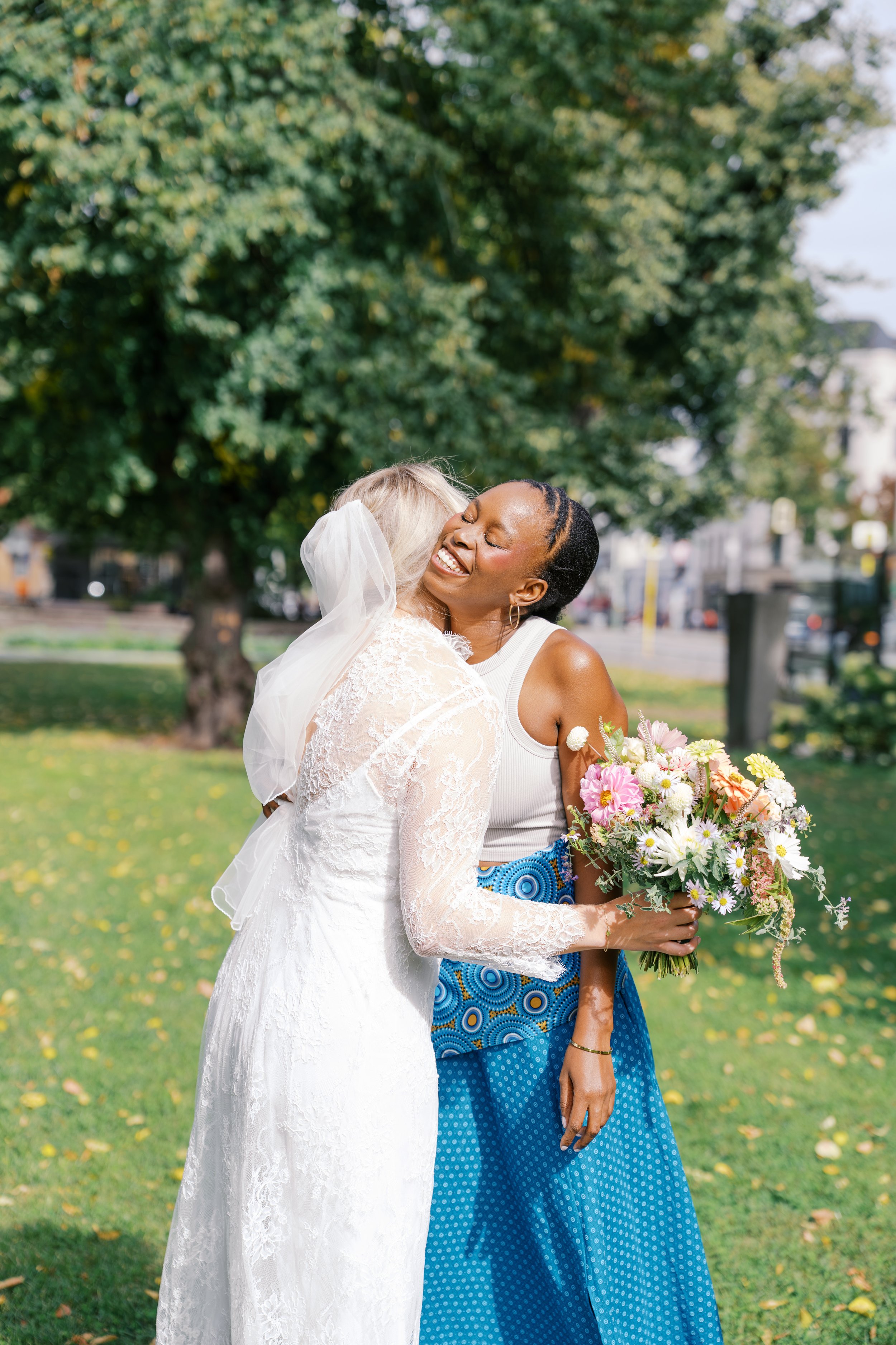 Bride hugging her guest after her Hochzeitsvilla wedding