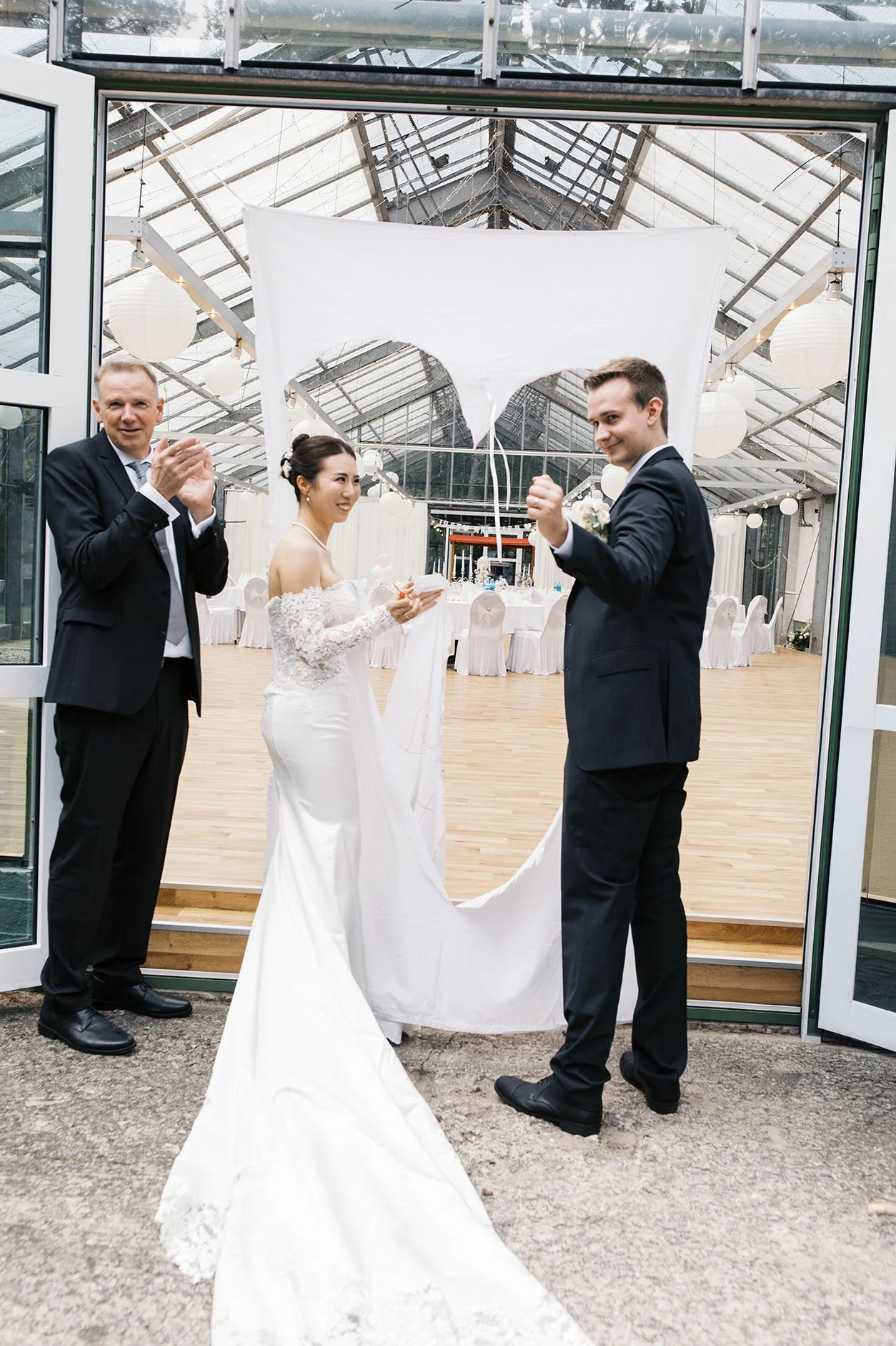 A German wedding with the interracial couple celebrating their wedding day in Berlin.