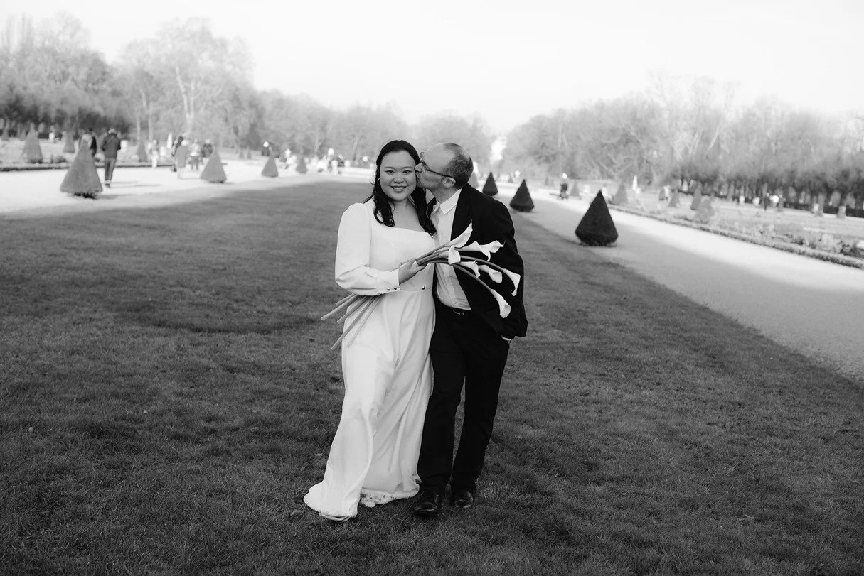 a couple getting their engagement photos taken at schloss charlottenburg