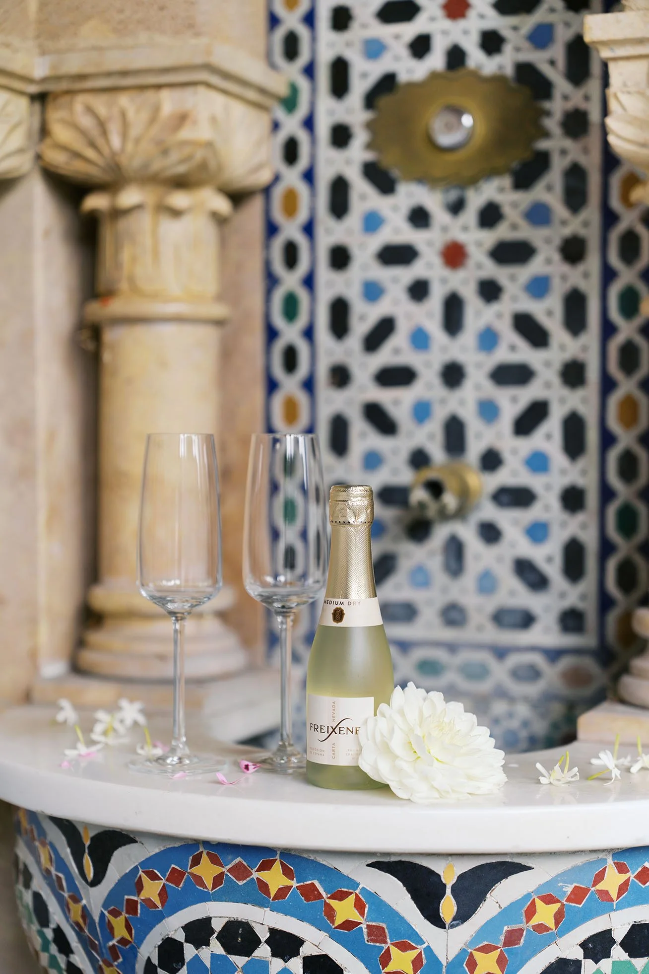 Champagne, glasses and flower decorations prepared for a Berlin proposal.
