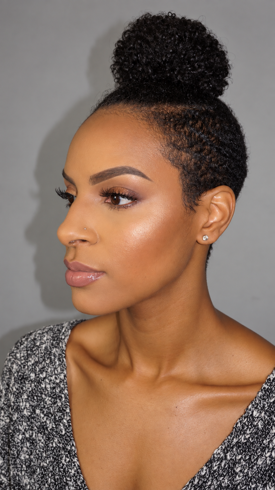 Elegant Curly Bun Beauty Portrait.png