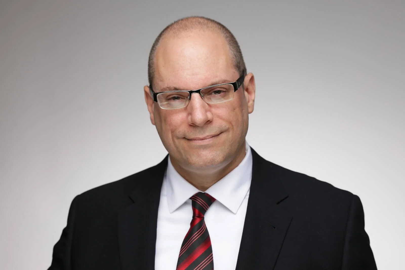 Portrait of Dr. Paul J. Scalise, energy sector expert and advisor to The Delphi Network, specializing in Japanese infrastructure and regulatory risk.