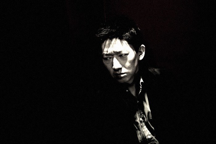 Portrait of Mitch Murata, Managing Partner of Black Pearl Partners and advisor to The Delphi Network, specializing in government relations and strategic access in Tokyo.