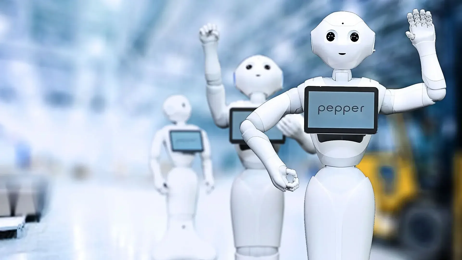 A group of white Pepper robots by SoftBank, representing the mass adoption of Intelligent Robots to solve Japan's labor shortage and boost industrial productivity.
