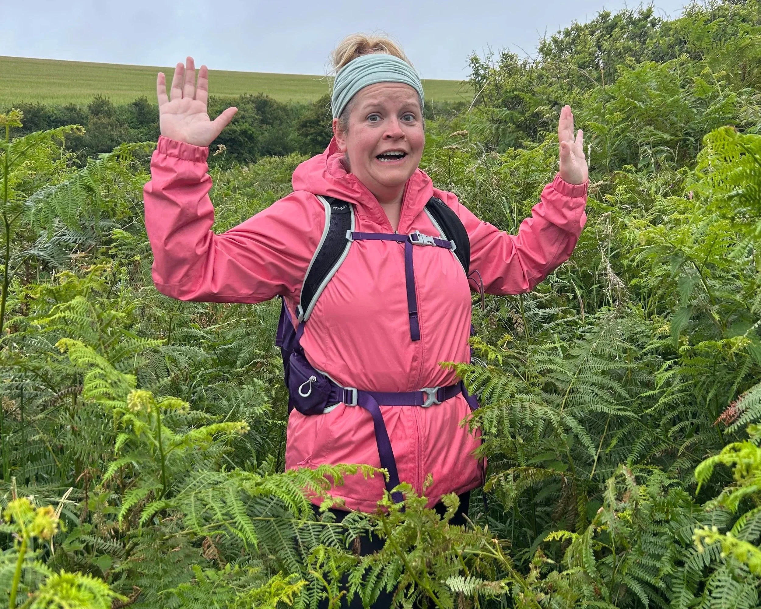 Sometimes it can feel like you're getting lost in your grief, but there's always a way out @Jules Lowe Counselling Image of me with a panicked look on my face in a "jungle" of ferns.