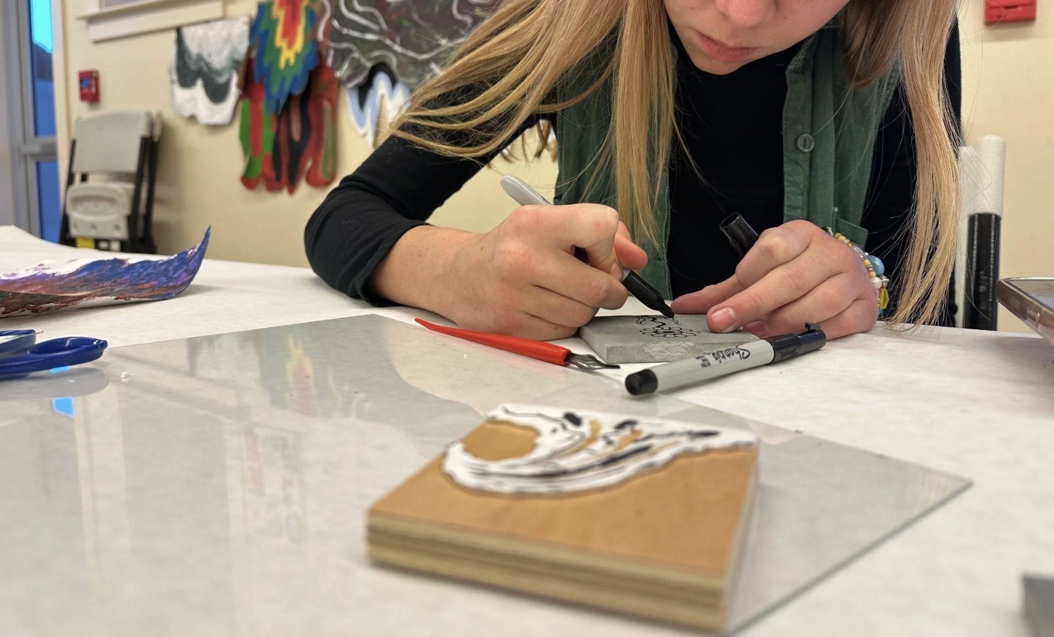 Student_Working_on_Linocut__Monica_Ocegueda.jpg