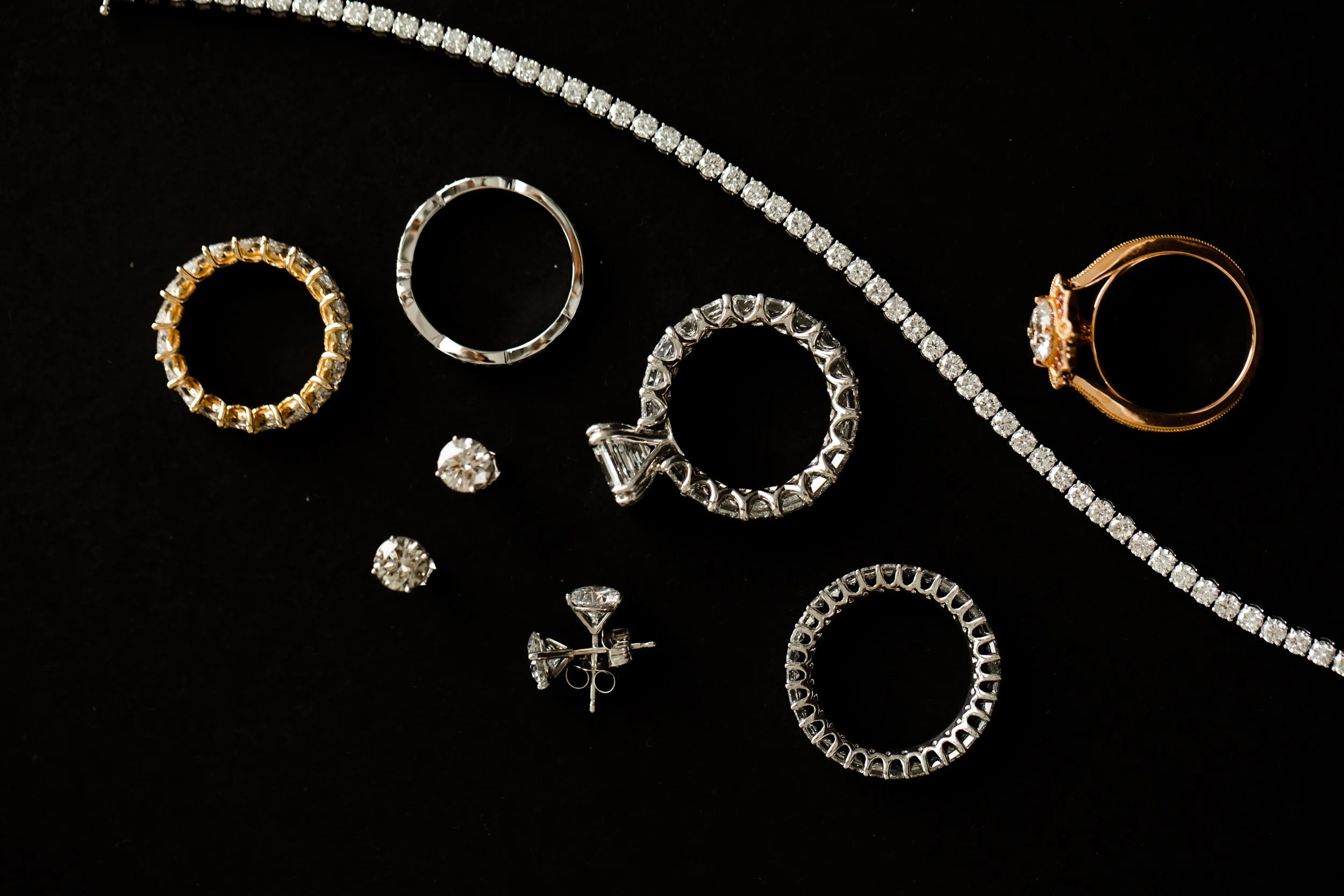 Our designs embody our philosophy: from eternity bands to custom engagement rings and wedding bands. Each piece, whether a necklace or bracelet, is crafted with meticulously selected stones and expert craftsmanship. These creations capture unique sto