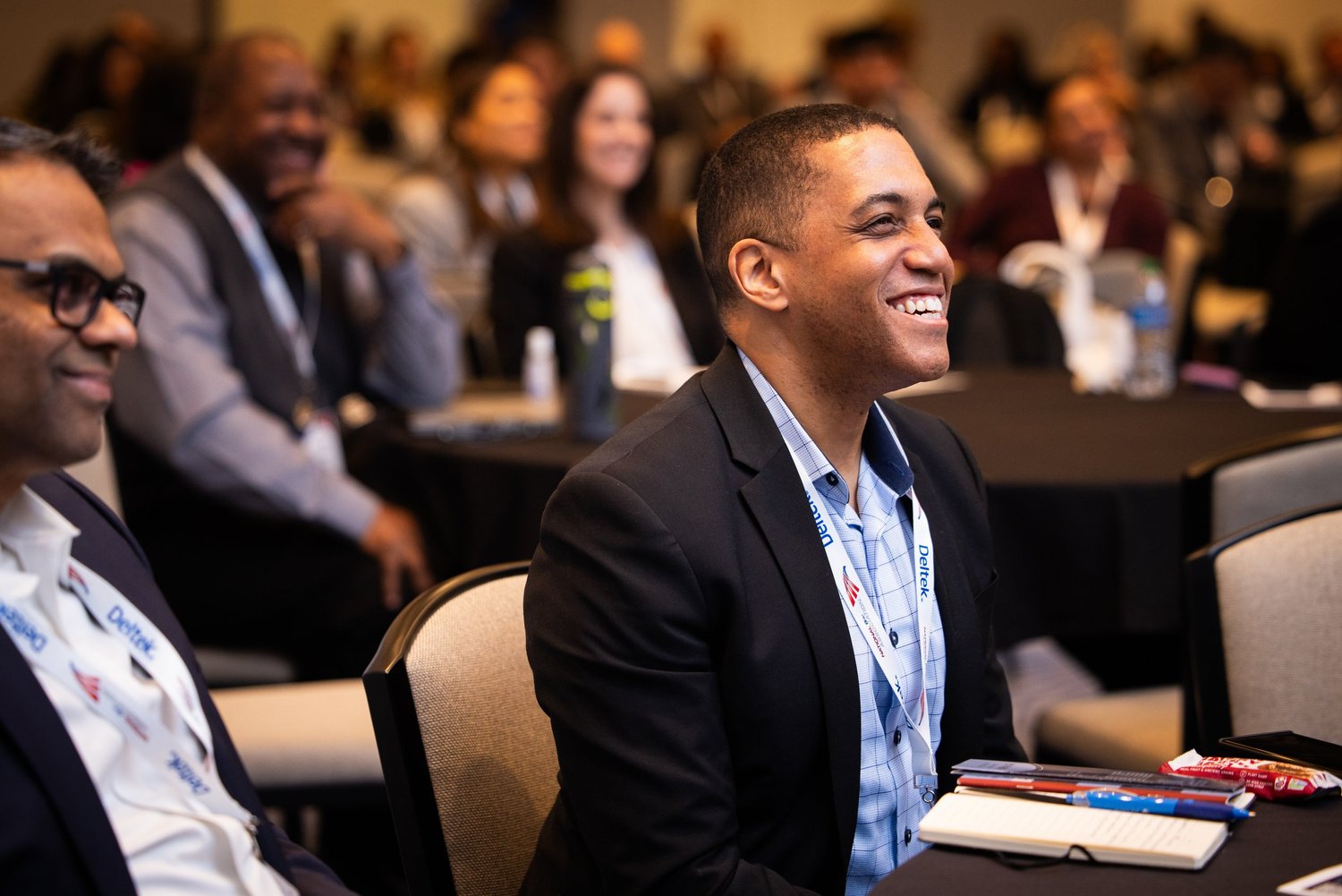 Attendee smiling during a session