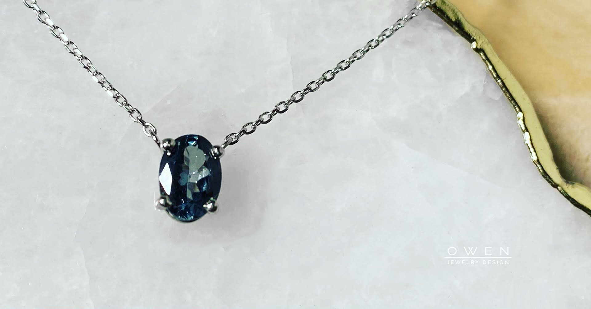 CUSTOM WHITE GOLD PENDANT WITH GREY SPINEL
