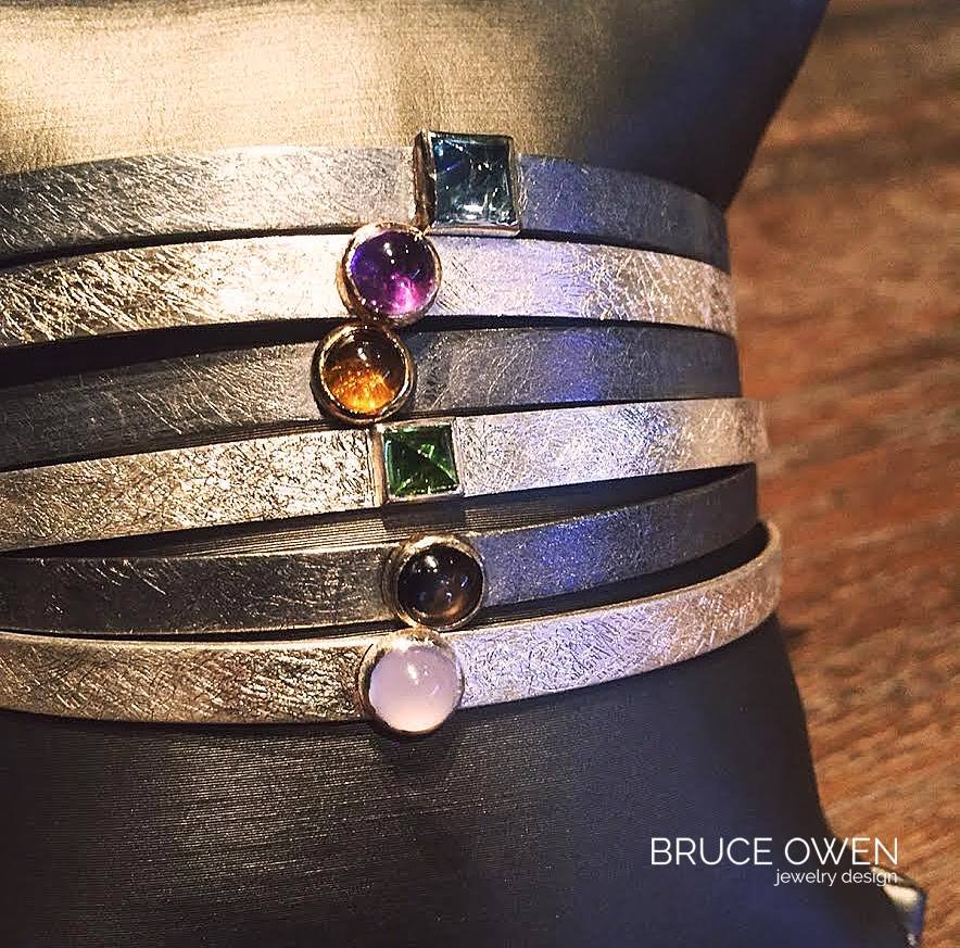CUSTOM STERLING SILVER AND GOLD CUFF BRACELETS WITH VARIOUS GEMSTONES.jpg