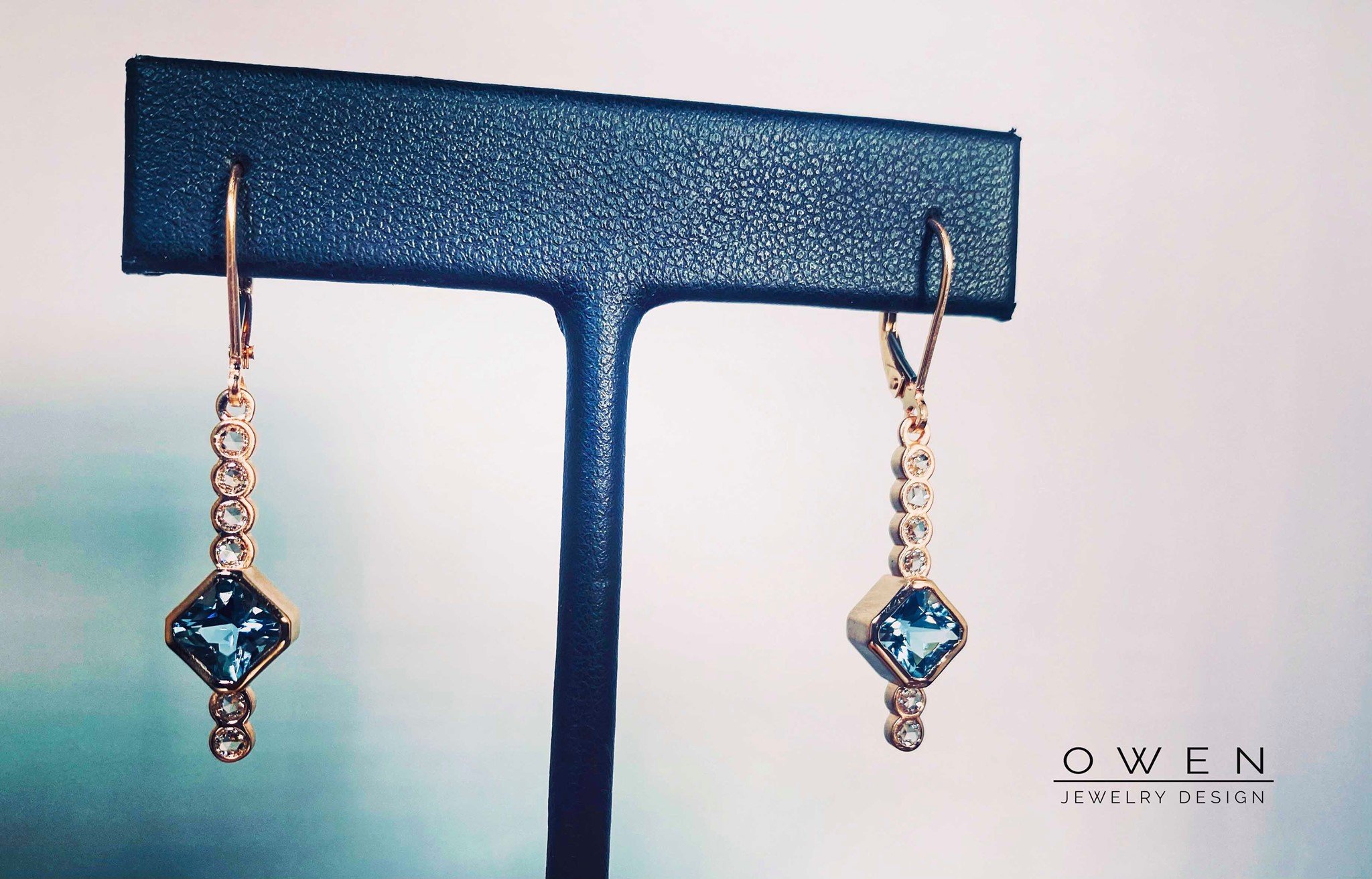CUSTOM ROSE GOLD EARRINGS CONTAINING BRAZILIAN AQUAMARINE AND ROSE CUTE DIAMONDS.jpg