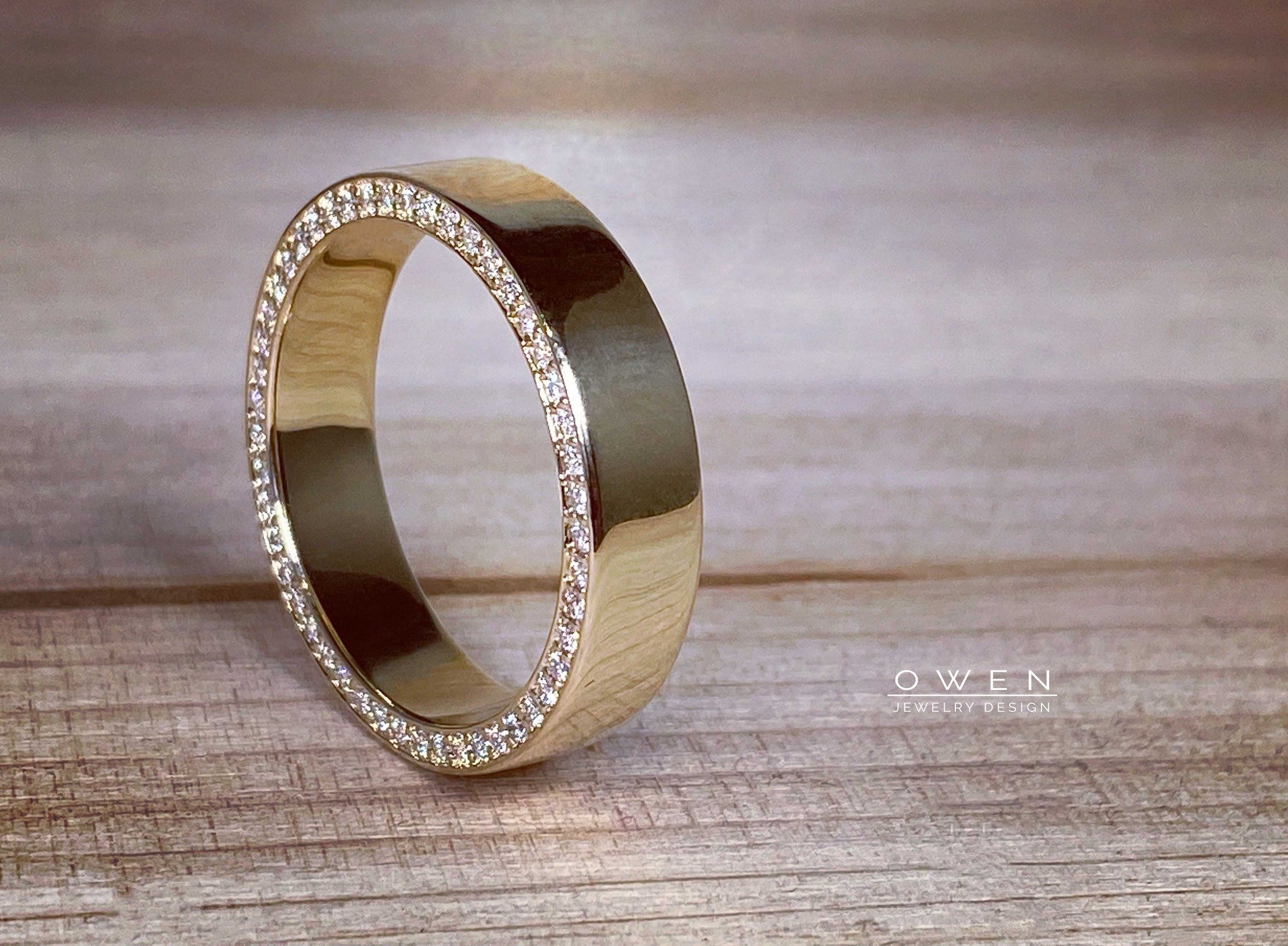 CUSTOM YELLOW GOLD WEDDING BAND WITH ROUND BRILLIANT CUT DIAMONDS.jpg