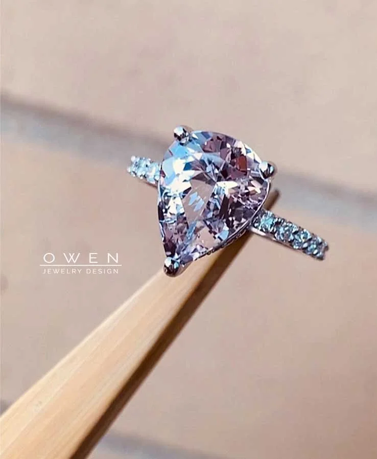 CUSTOM WHITE GOLD RING WITH LIGHT PINK PEAR SHAPED MORGANITE AND ROUD CUT DIAMONDS