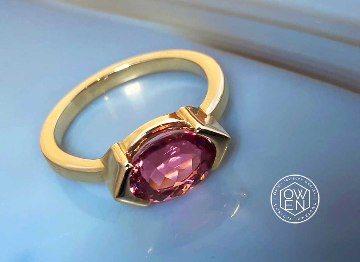 CUSTOM YELLOW GOLD RING WITH A BRAZILIAN PINK TOURMALINE.jpg