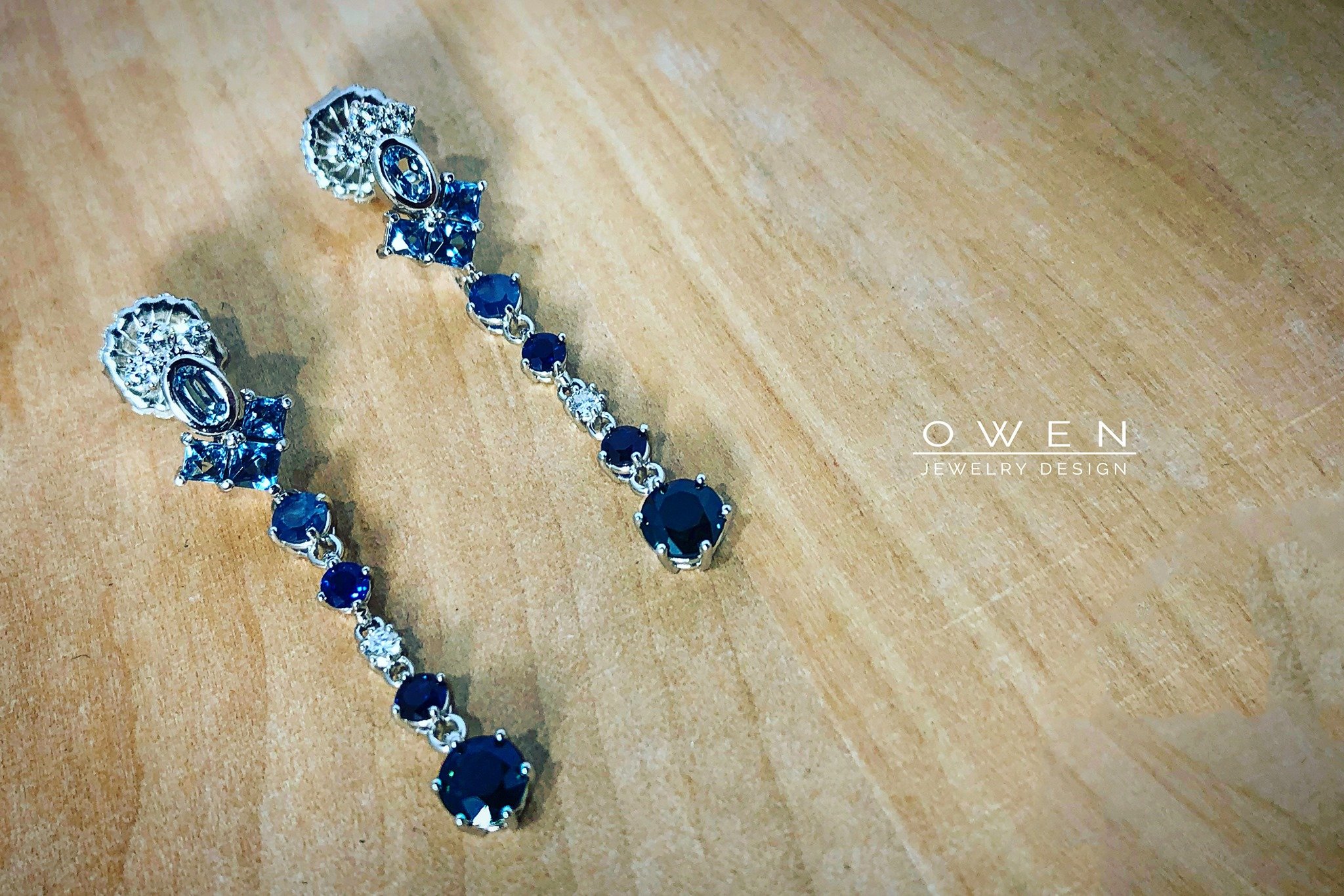 CUSTOM PLATIMUN DANGLE EARRINGS WITH AQUAMARINE, BLUE SAPPHIRE, AND ROUND BRILLIANT CUT DIAMONDS.jpg