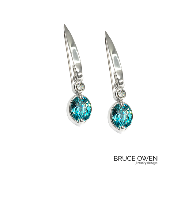 CUSTOM WHITE GOLD FRENCH HOOP EARRINGS WITH BLUE ZIRCON AND DIAMONDS.png