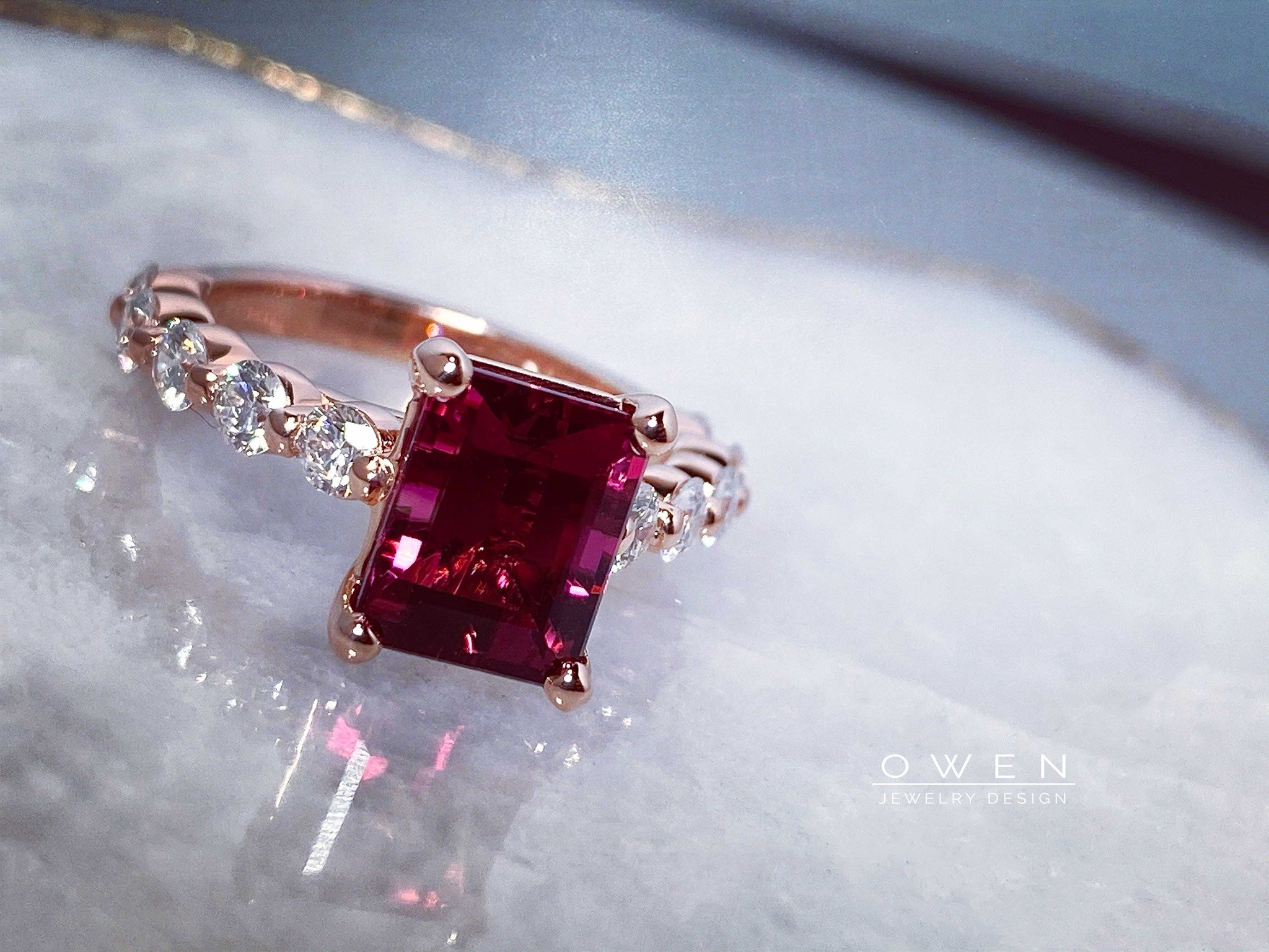 CUSTOM ROSE GOLD RING WITH A BRAZILIAN RUBELLITE AND ROUND ACCENT DIAMONDS.jpg