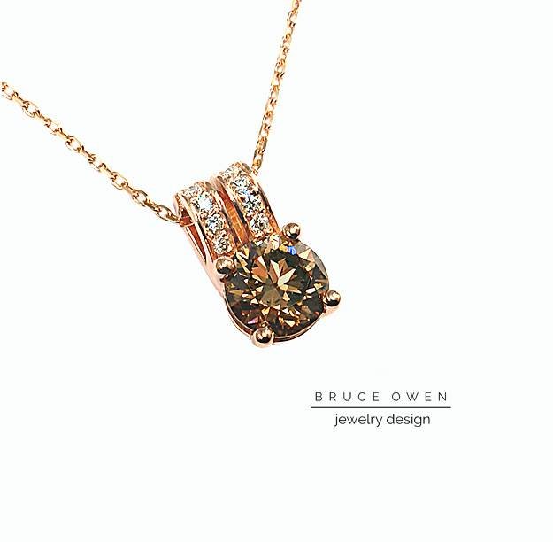 CUSTOM ROSE GOLD PENDANT WITH A ROUND CUT BROWN DIAMOND AND ROUND ACCENT DIAMONDS.jpg