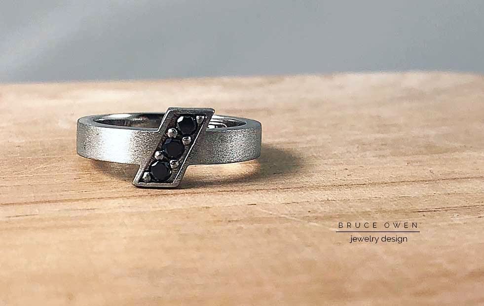 WHITE GOLD BAND WITH BLACK DIAMONDS