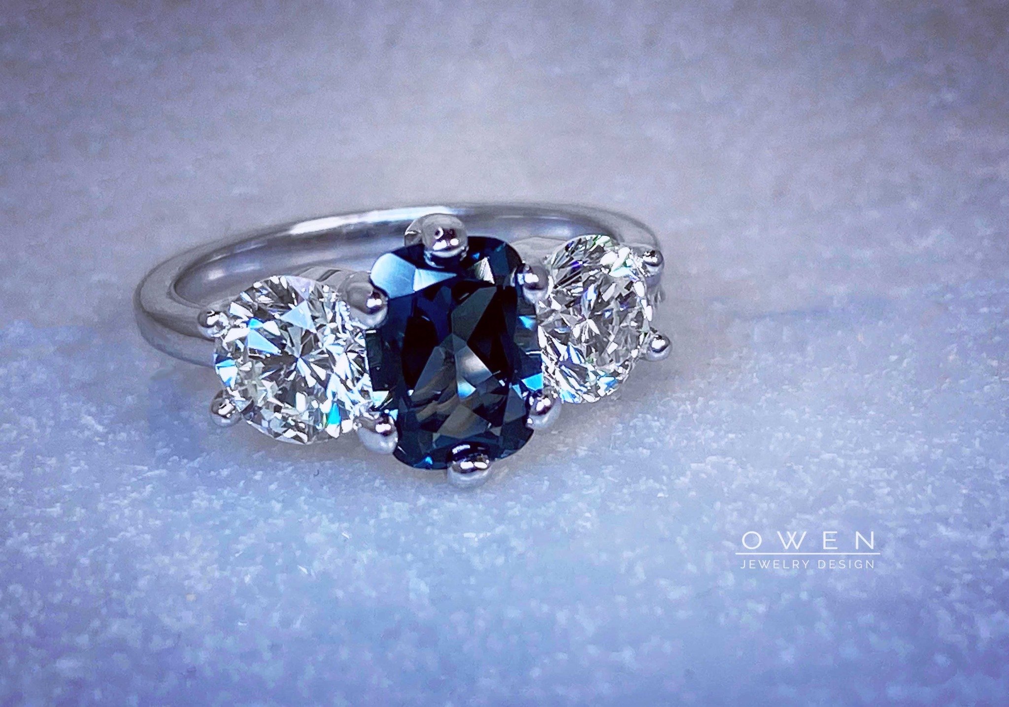 CUSTOM WHITE GOLD RING WITH LONDON BLUE TOPAZ AND ROUND CUT DIAMONDS.jpg