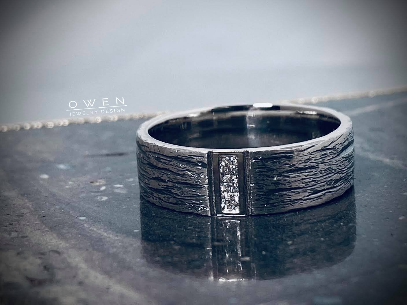 CUSTOM BLACK RHODIUM WHITE GOLD WEDDING BAND WITH THREE ROUND BRILLIANT CUT DIAMONDS.jpg