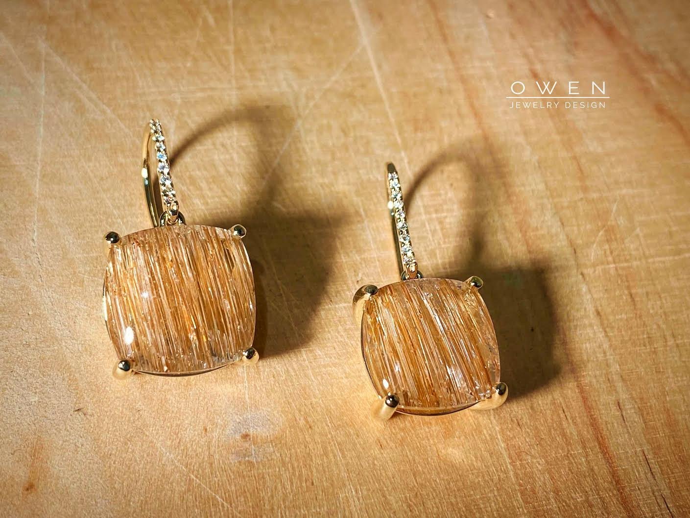 CUSTOM YELLOW GOLD EARRINGS WITH RUTILATED QUARTZ AND ROUND BRILLIANT CUT DIAMONDS.jpg