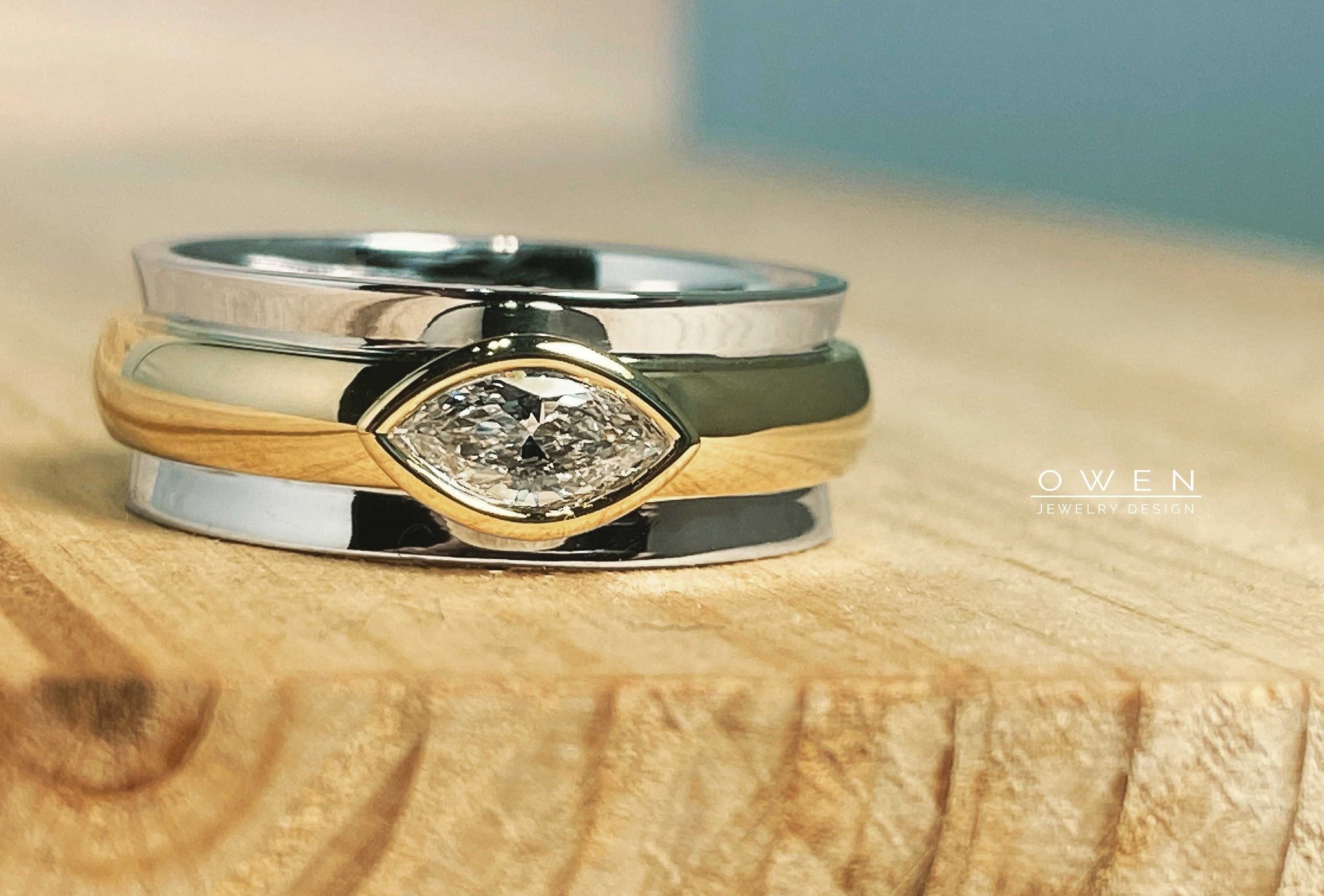CUSTOM WHITE AND YELLOW GOLD BAND WITH MARQUISE DIAMOND.jpg