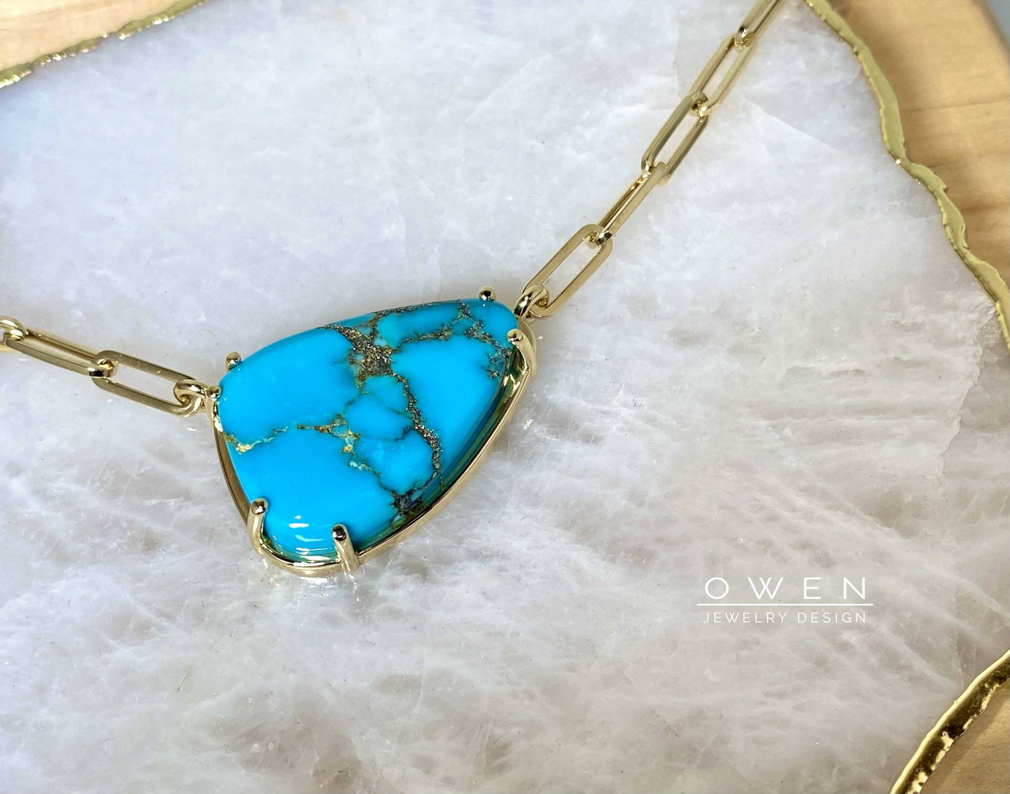 CUSTOM YELLOW GOLD PENDANT WITH A TURQUOISE ON A PAPER CLIP CHAIN.jpg