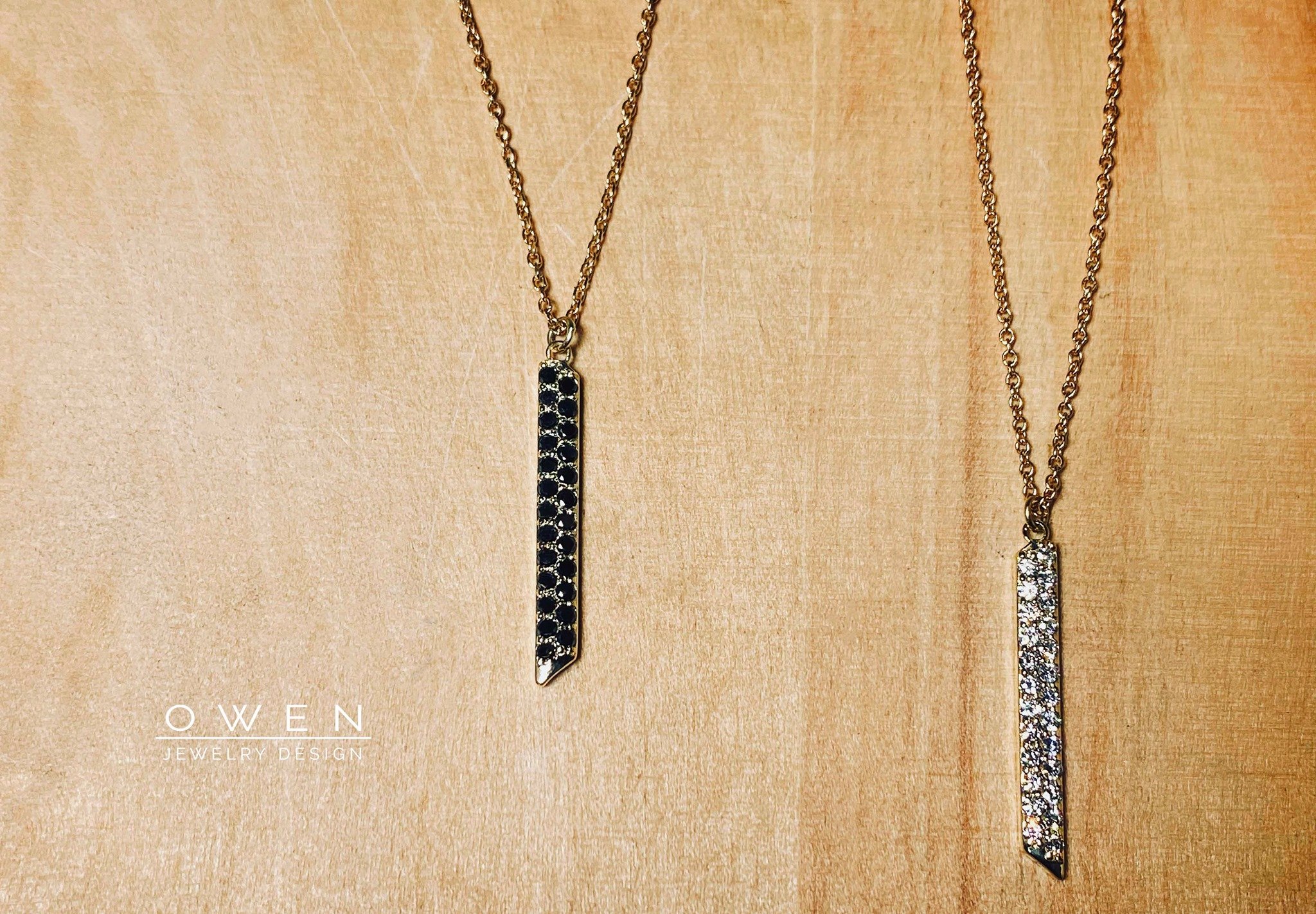CUSTOM YELLOW GOLD PENDANTS WITH BLACK AND WHITE DIAMONDS.jpg