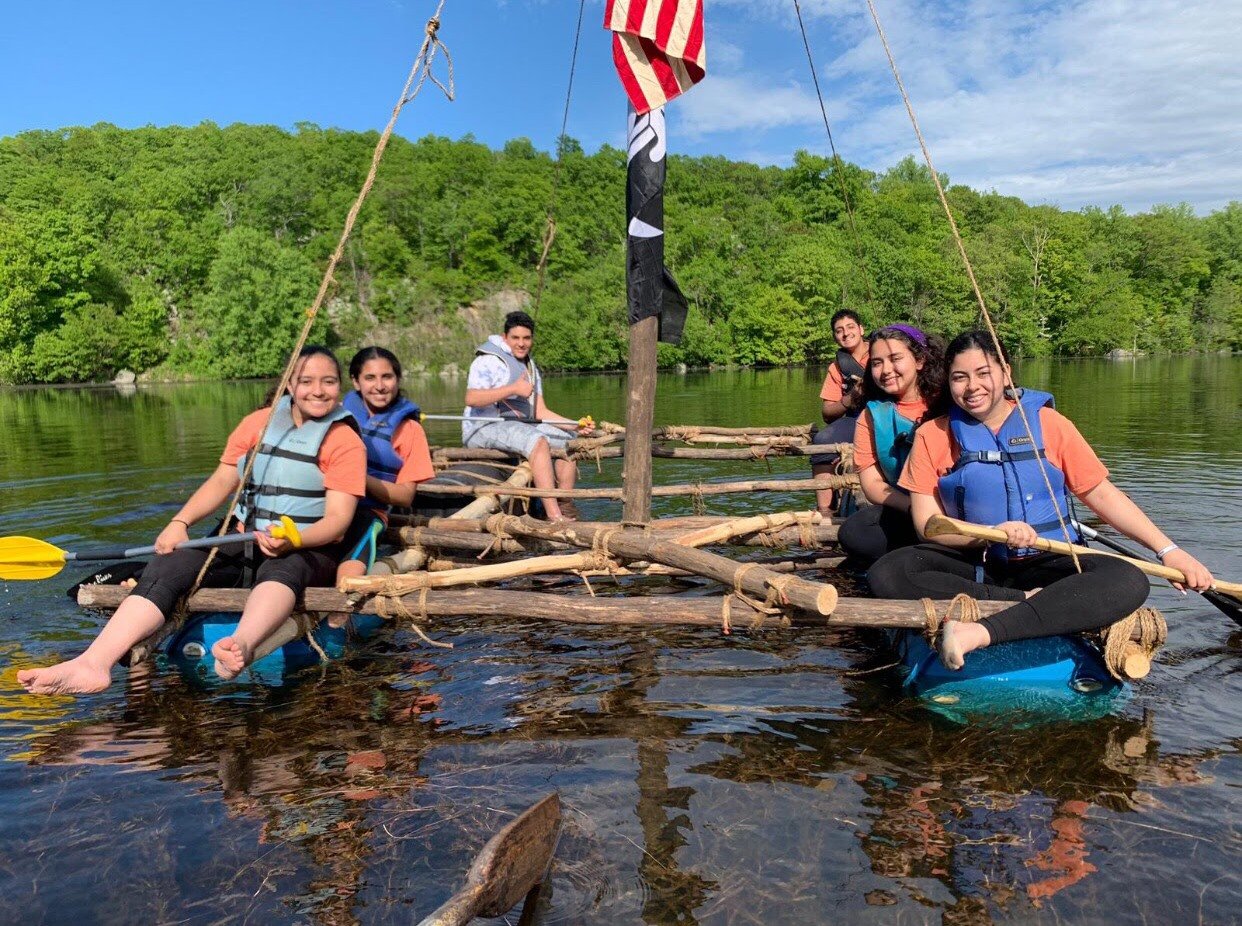 scouts on a handmade raft