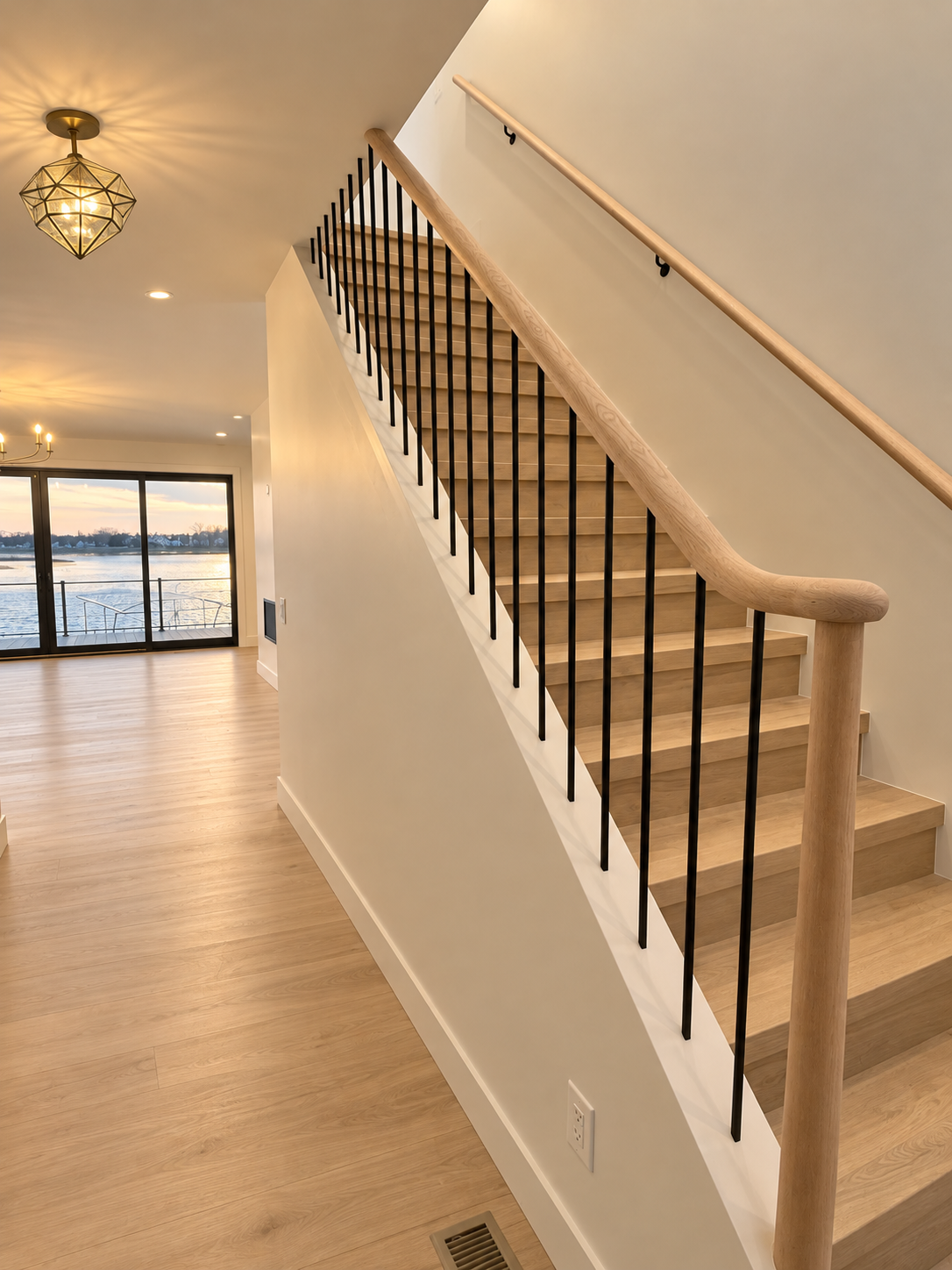 Warm Minimalist Stairway Overlooking Waterfront.png