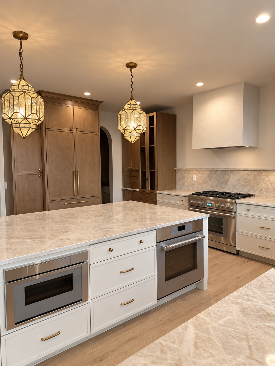 Warm Modern Kitchen with Brass Pendants.png