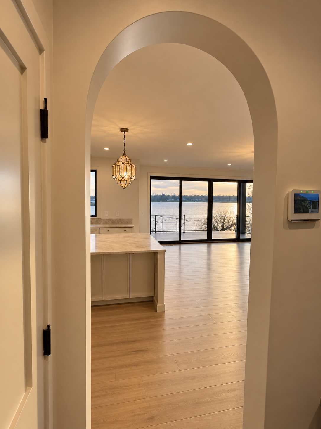 Warm Arched Living Space by the Water.png