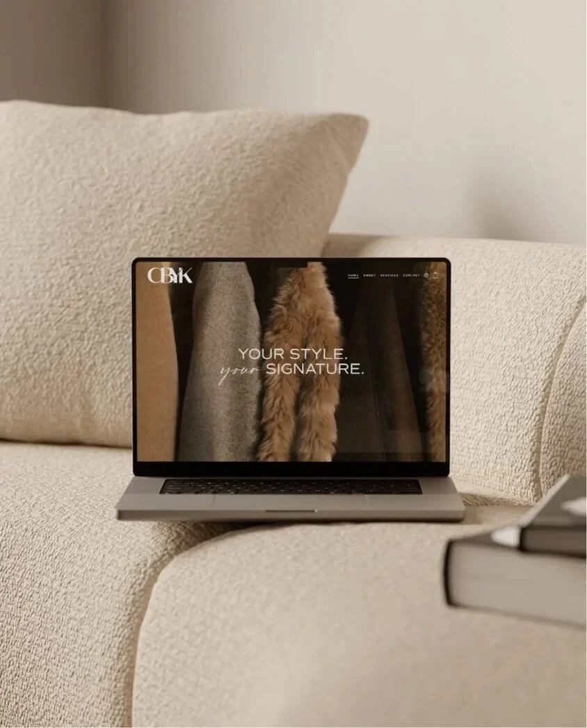 Beauty and wellness website design agency​ showing off portfolio on a laptop