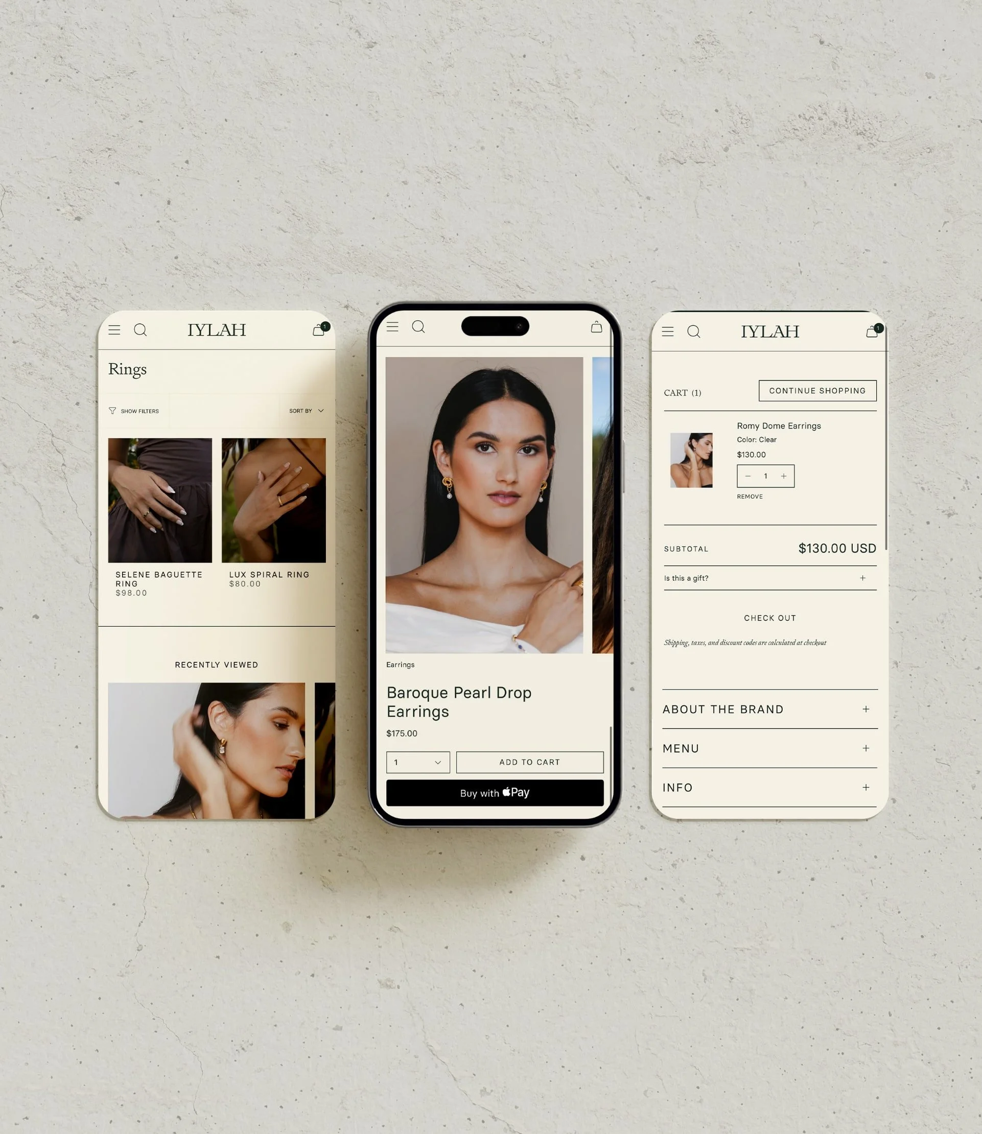 image of phone with image of a woman wearing earrings