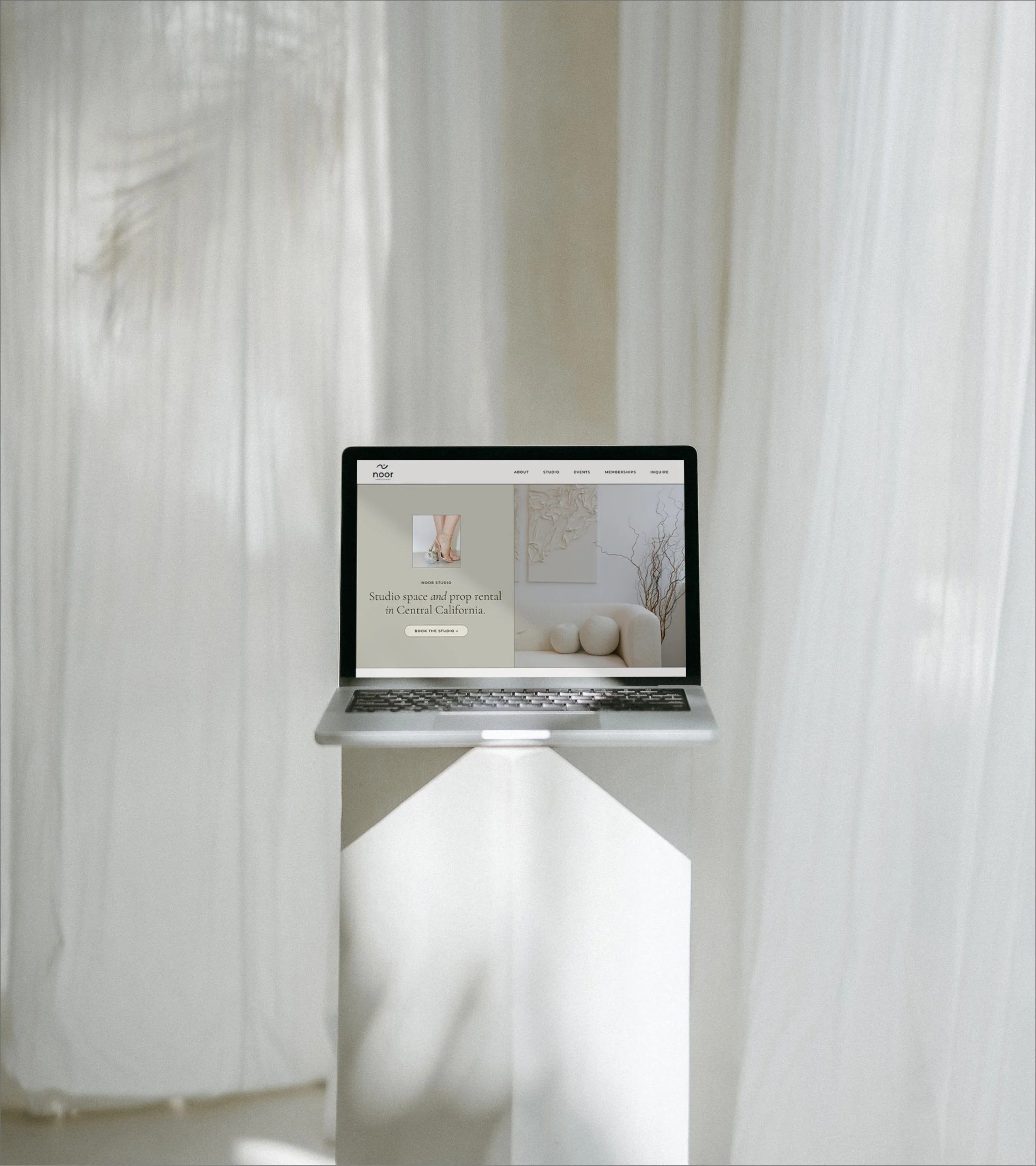Computer with luxury salon website design inspiration​.