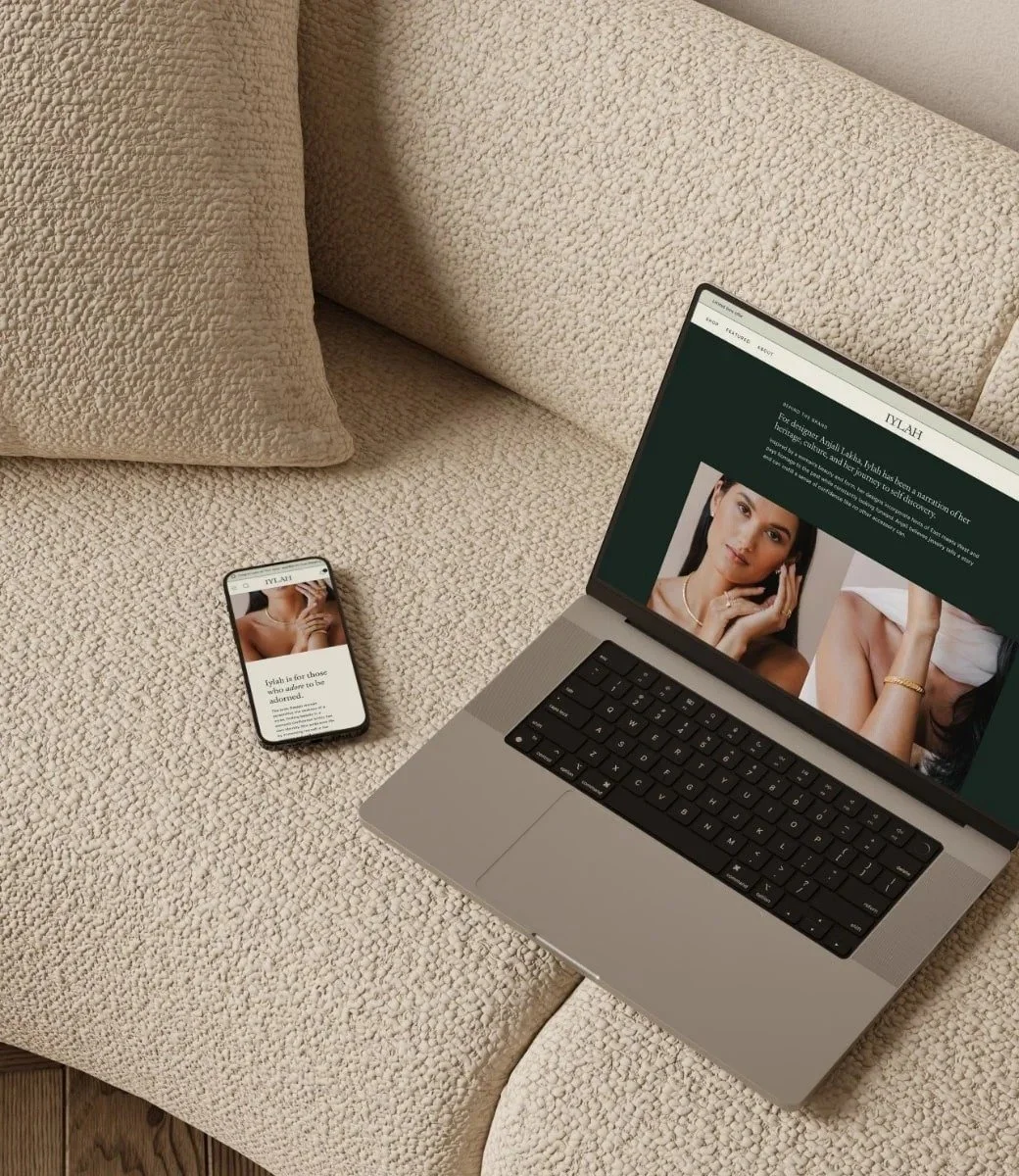 Computer and phone with luxury salon website design inspiration​.