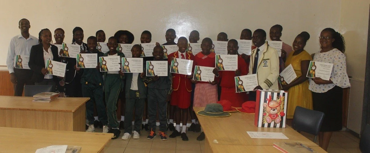 Children receiving certificates of learning